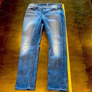 Stoned washed blue jeans size 25 w/ 37” L.